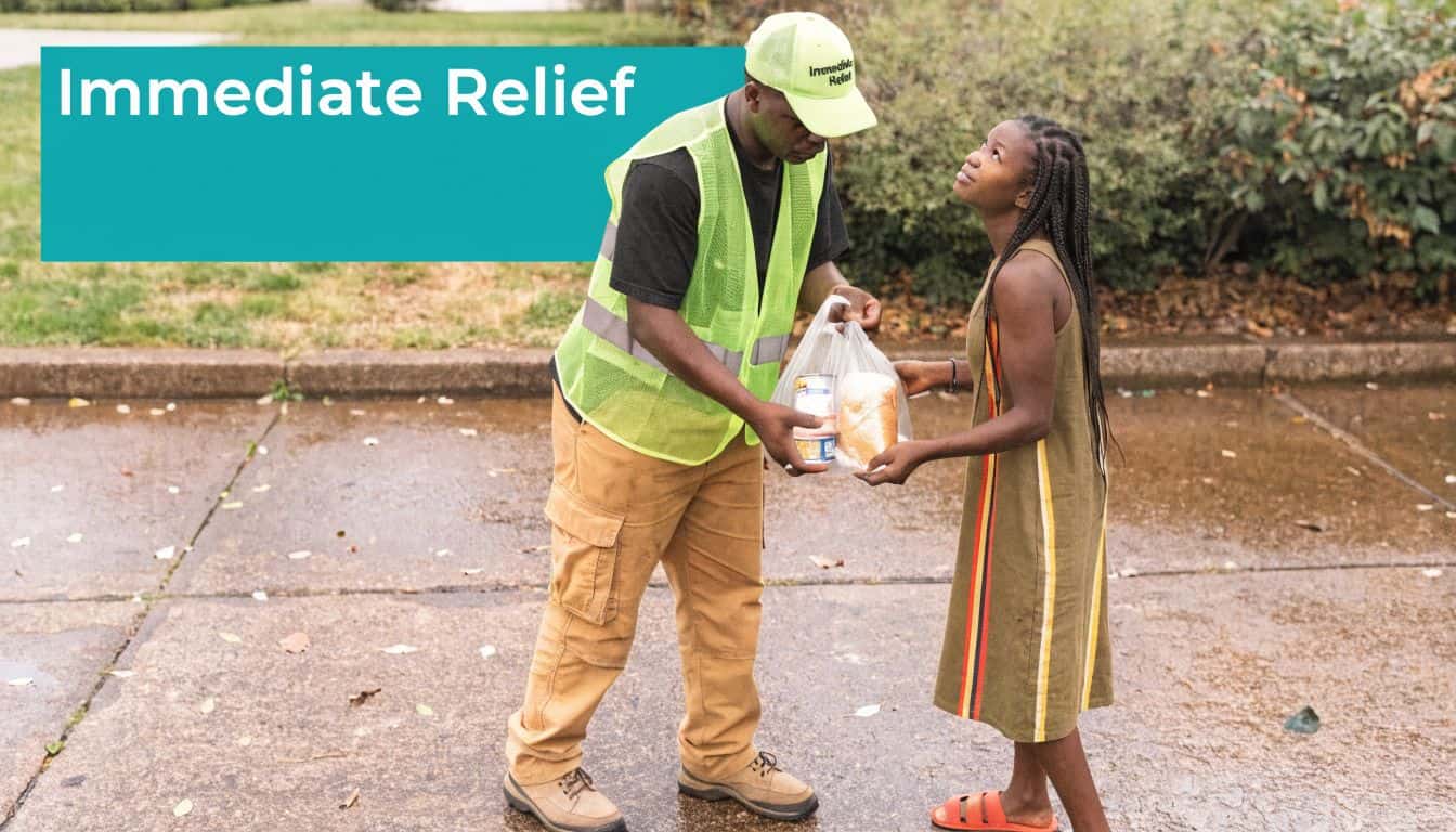 Volunteer worker in a high-visibility vest handing a bag of food to a young girl.