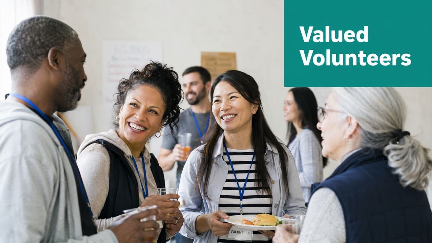 Volunteers sharing food and conversation at an indoor appreciation event